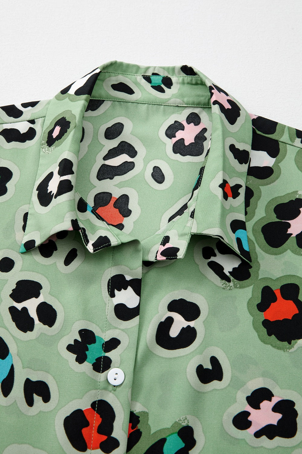 Sage leopard print resort shirt with collar and button detail