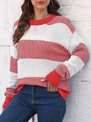 Striped knit crewneck sweater in red and white with ribbed trim and cuffs.