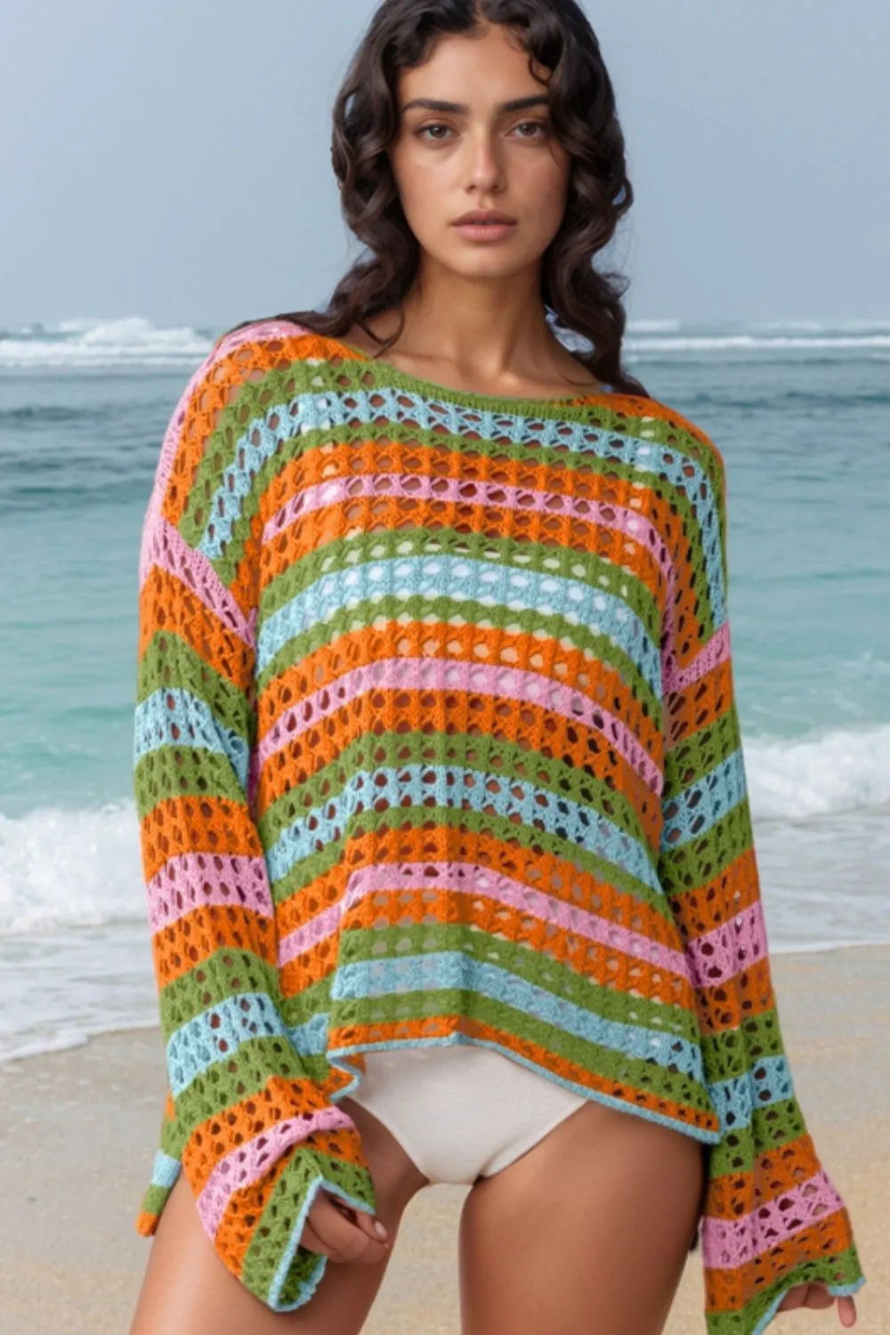 Striped crochet beach cover-up with a relaxed fit and open knit detail.