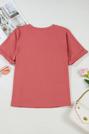 Burnt coral casual t-shirt with rolled sleeves and a crew neck.