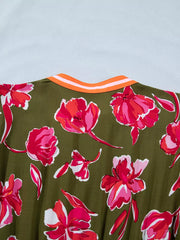 Print split neck dress in olive green with a bold floral print and striped neckline detail.