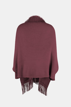 Wine faux fur trimmed fringe cape with a cozy knit texture.
