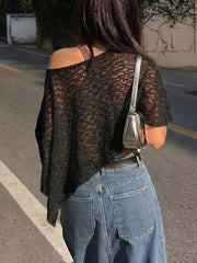 Black sheer one-shoulder cropped cardigan with lace pattern.