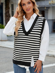 Striped knit vest with V-neck and side slits, layered over a white shirt.