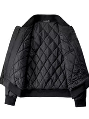 Black quilted bomber jacket with ribbed collar and cuffs