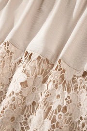 Beige maxi dress with airy floral lace hem detail