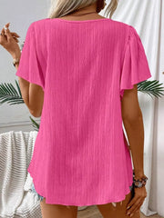 Rose Red embroidered square neck flutter blouse with textured fabric.