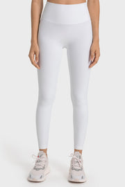 White seamless high-waist performance leggings with a smooth finish.