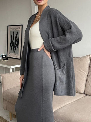 Dark gray ribbed knit cardigan and midi skirt set with front pockets and a v-neck cami.