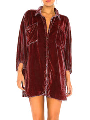 Velvet oversized shirt in deep purple with button front and chest pockets.