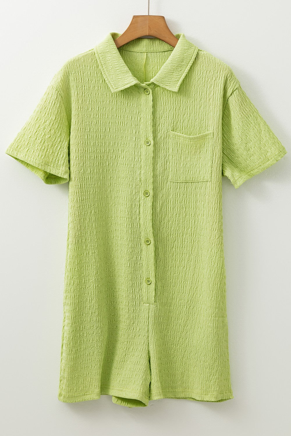 Lime textured collared romper with patch pocket and button front