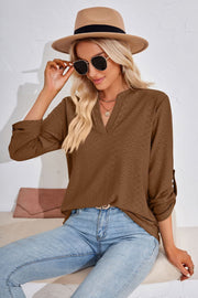 Brown textured henley blouse with split neck and rolled sleeves