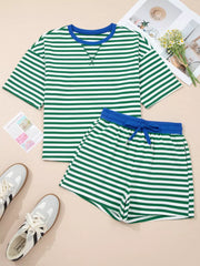 Green and white striped cotton boxy tee and shorts set with blue trim and drawstring.