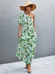 Light green tropical print one-shoulder maxi dress with balloon sleeves and a tie waist.