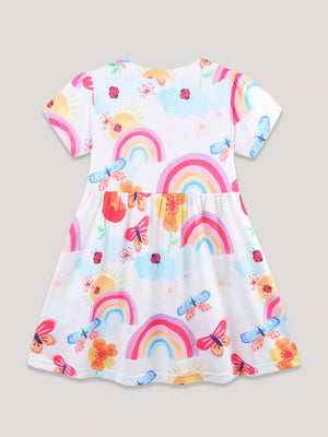 Toddler white dress with rainbow, butterfly, ladybug, sun, and cloud print.