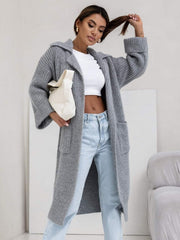 Gray oversized knit lapel cardigan with pockets and a long length.