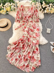 Floral print crop top and ruched skirt set with tie waist and puff sleeves.