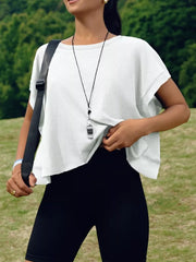 White t-shirt with exposed seams and a cutout back detail, short sleeves, crew neck