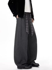 Men's gray relaxed fit wide-leg sweatpants with a plaid tie belt.