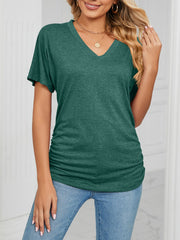Relaxed dark green V-neck short sleeve t-shirt with ruched side detail.