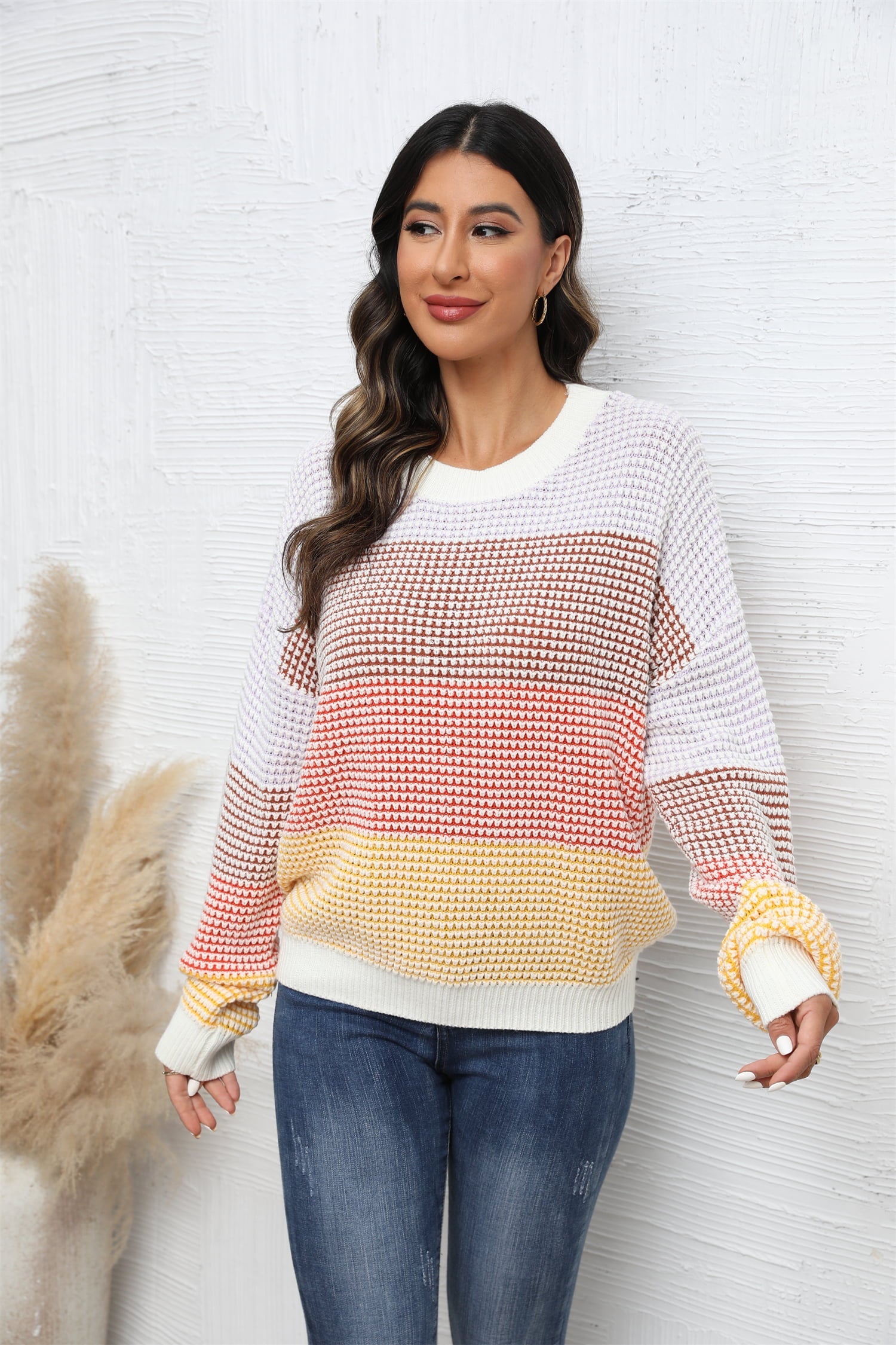 Horizontal stripe waffle knit pullover sweater with crew neck and long sleeves.