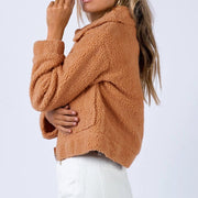 Textured sherpa cropped jacket in ochre with a collared neckline and button pockets.