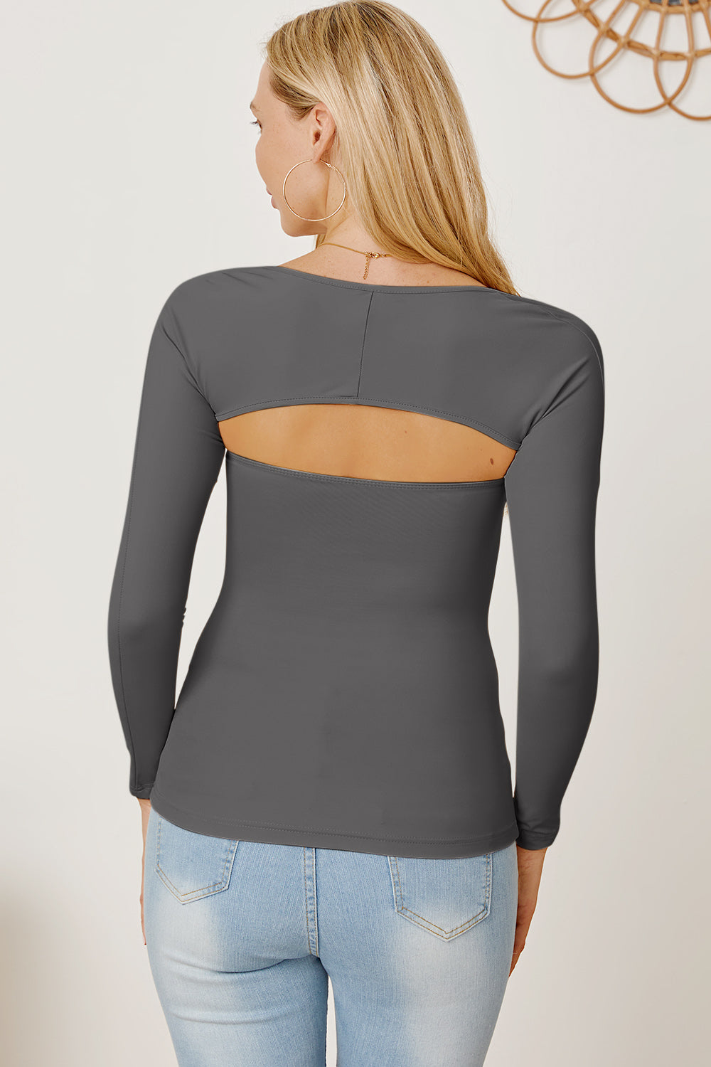 Dark gray long sleeve bodysuit with open back detail