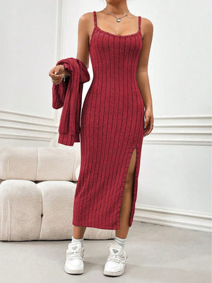 Orange-red ribbed knit midi dress with a high slit and matching cardigan.