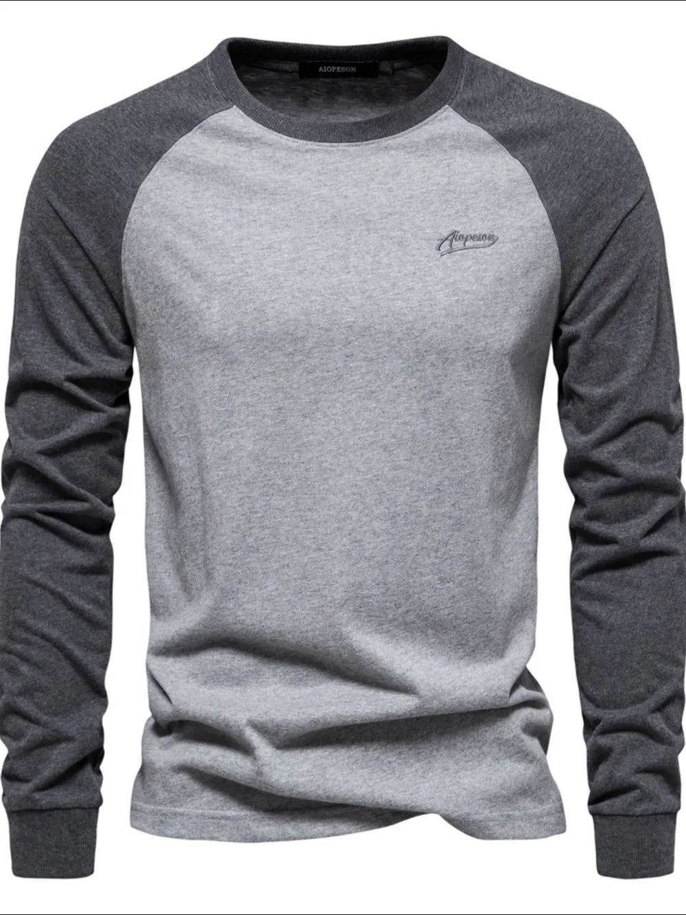 Colorblock raglan tee in gray and dark gray with a crew neck and embroidered logo.