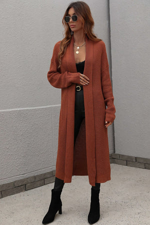 Brown textured knit maxi cardigan with open front and long sleeves.