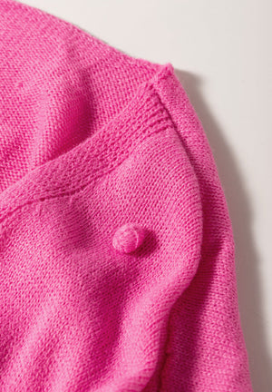 Pink acrylic bobble cardigan with textured knit detail