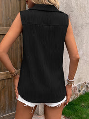 Black textured wave-pleat collared sleeveless blouse with button detail