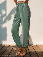 Gum Leaf relaxed-fit joggers with embroidered side trim