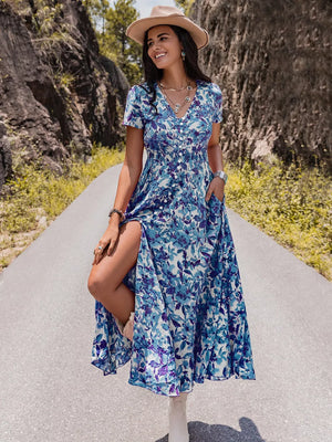 Floral V-neck midi dress with buttons, short sleeves, and a high slit.