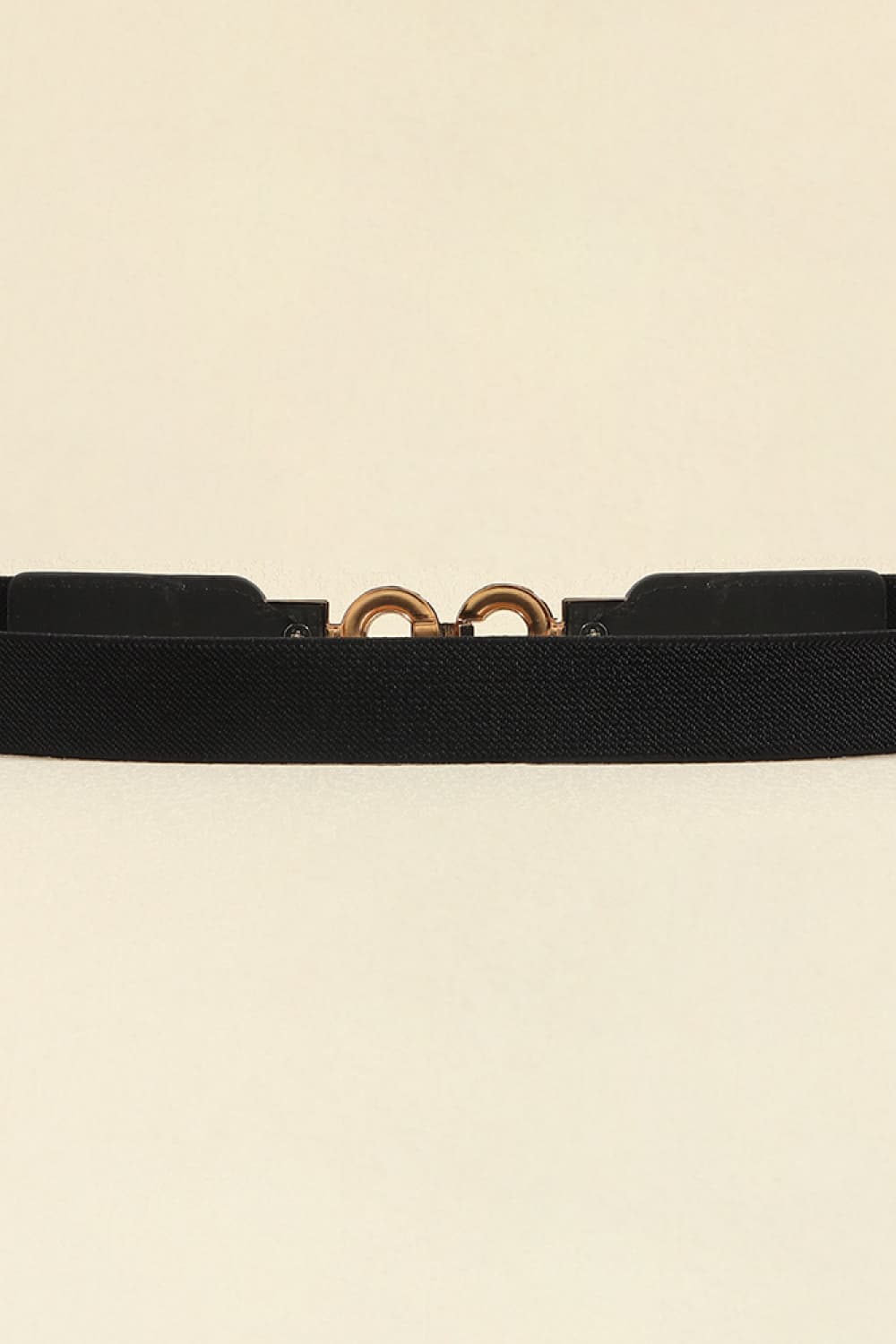 Black elastic belt with gold double loop buckle detail