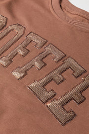 Taupe loungewear set with sequin coffee graphic detail.