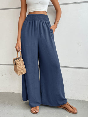Dusty blue textured palazzo lounge trousers with smocked waist and wide leg.