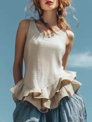 Off-white sleeveless tank top with ruffled hem detail