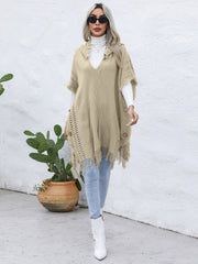 Khaki textured knit poncho with fringe and wooden buttons, V-neck, open sides