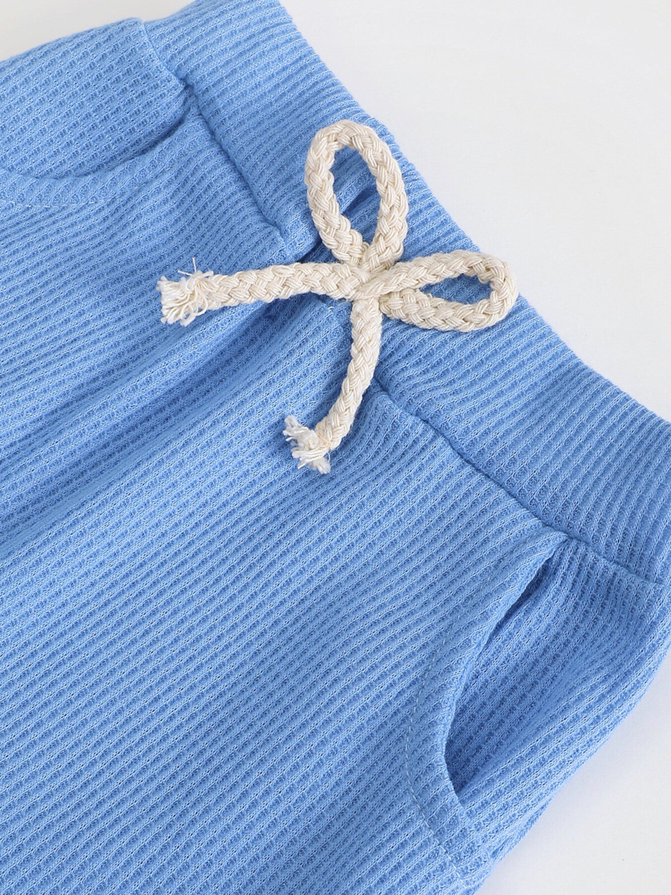 Blue cotton waffle knit pants with drawstring and pockets
