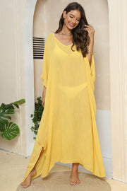 Yellow oversized caftan cover-up with V-neck, wide sleeves, and side slits