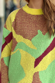 Geometric knit crewneck sweater in yellow, green, and maroon colorblock pattern.