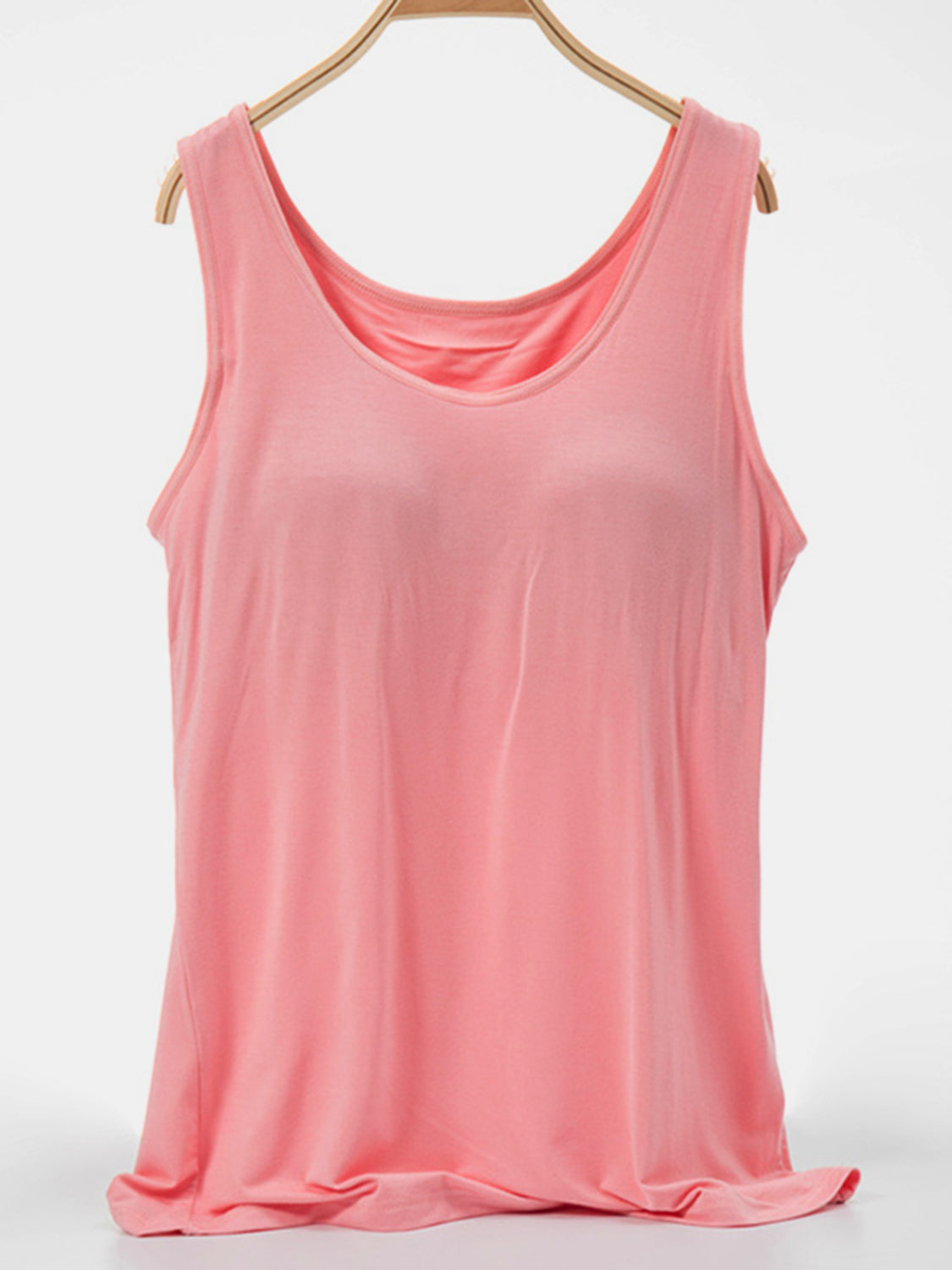 Pink scoop neck tank top with a relaxed fit.