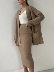Camel ribbed knit cardigan and midi skirt set with pockets, acrylic material.