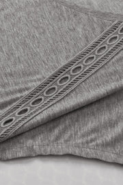 Dark Gray dolman sleeve tunic with lace inset detail on the sleeve.