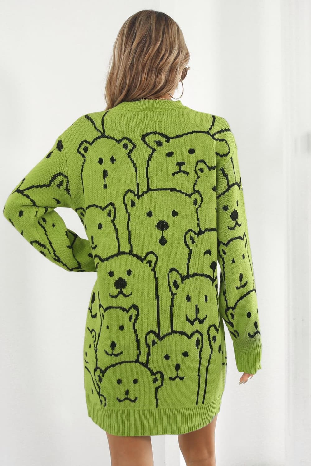 Yellow-green knit dress with allover black bear motif.