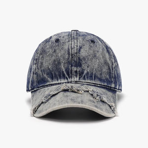 Acid wash distressed baseball cap in Indigo with frayed brim detail.