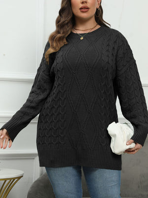 Black cable knit diamond stitch sweater with crew neck and long sleeves.