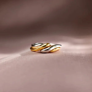 Two-tone gold open ring with intertwined design