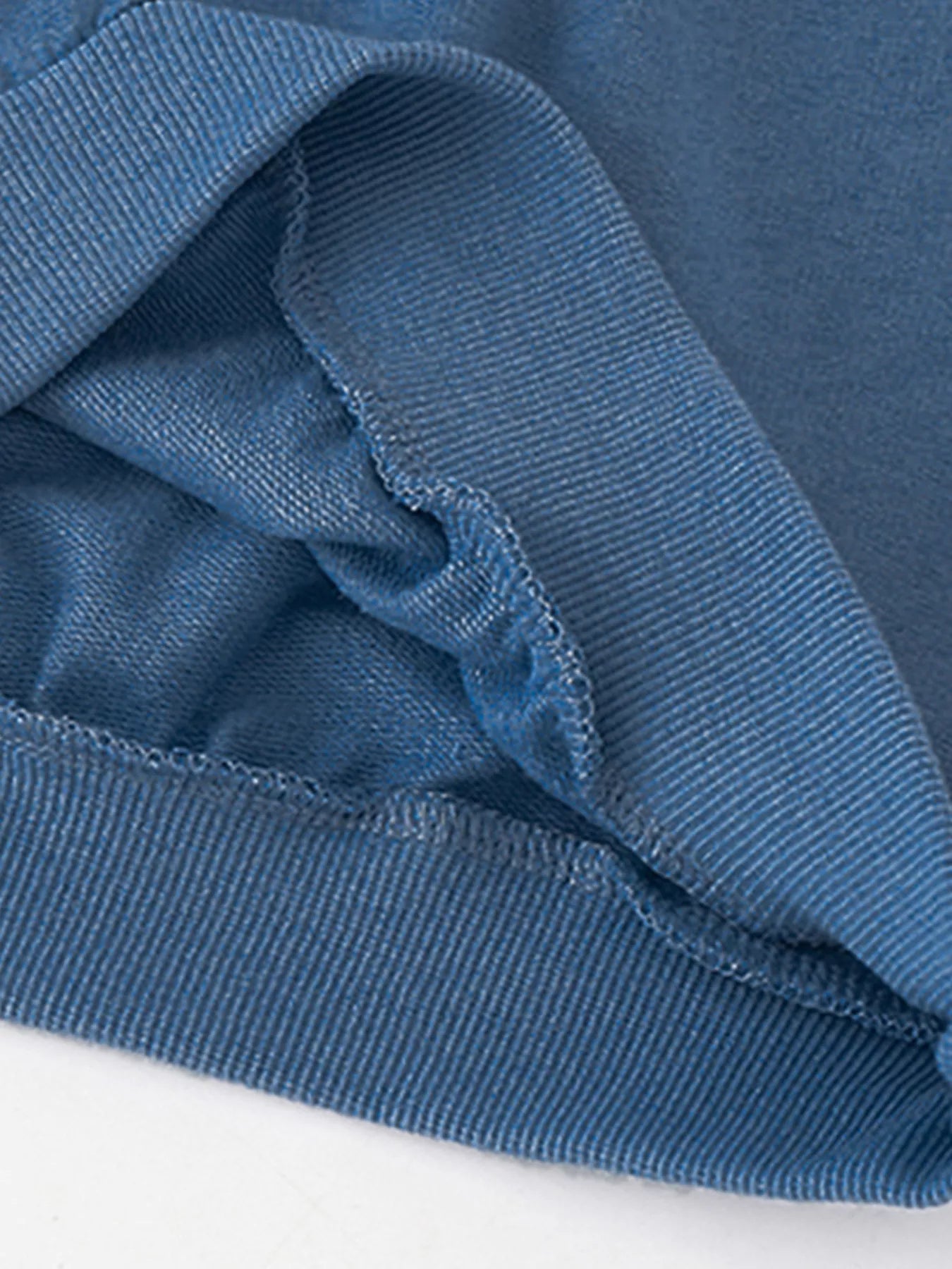 Children's French Blue 100% cotton crew neck sweatshirt detail.